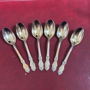 Elegant Silver and Gold Spoons Set